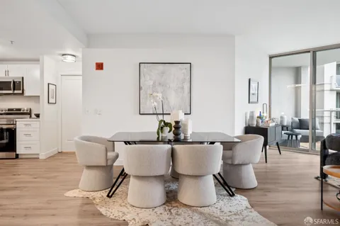 a bathroom with a sink toilet and mirror