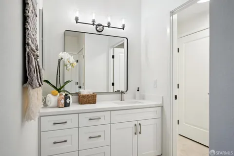 a bathroom with a toilet and a sink