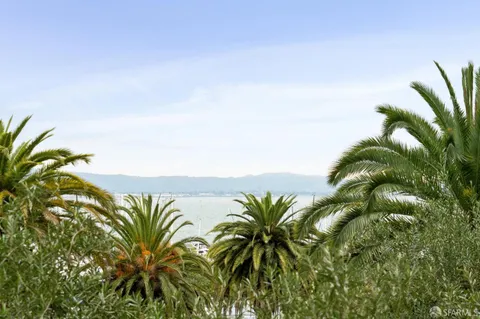 a view of a house with a street