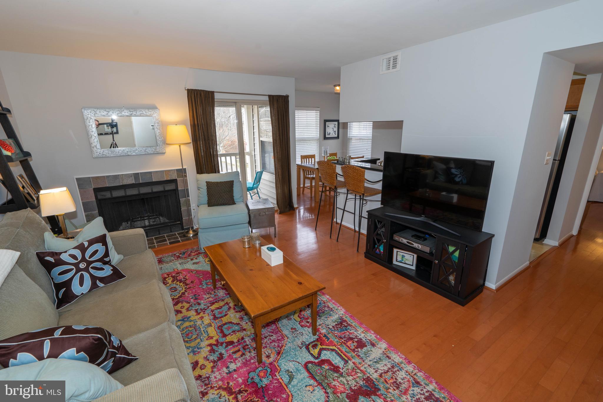 1711 Ascot Way, Unit C Reston, VA 20190 - Photo 2 of 26 Living Room with Fireplace