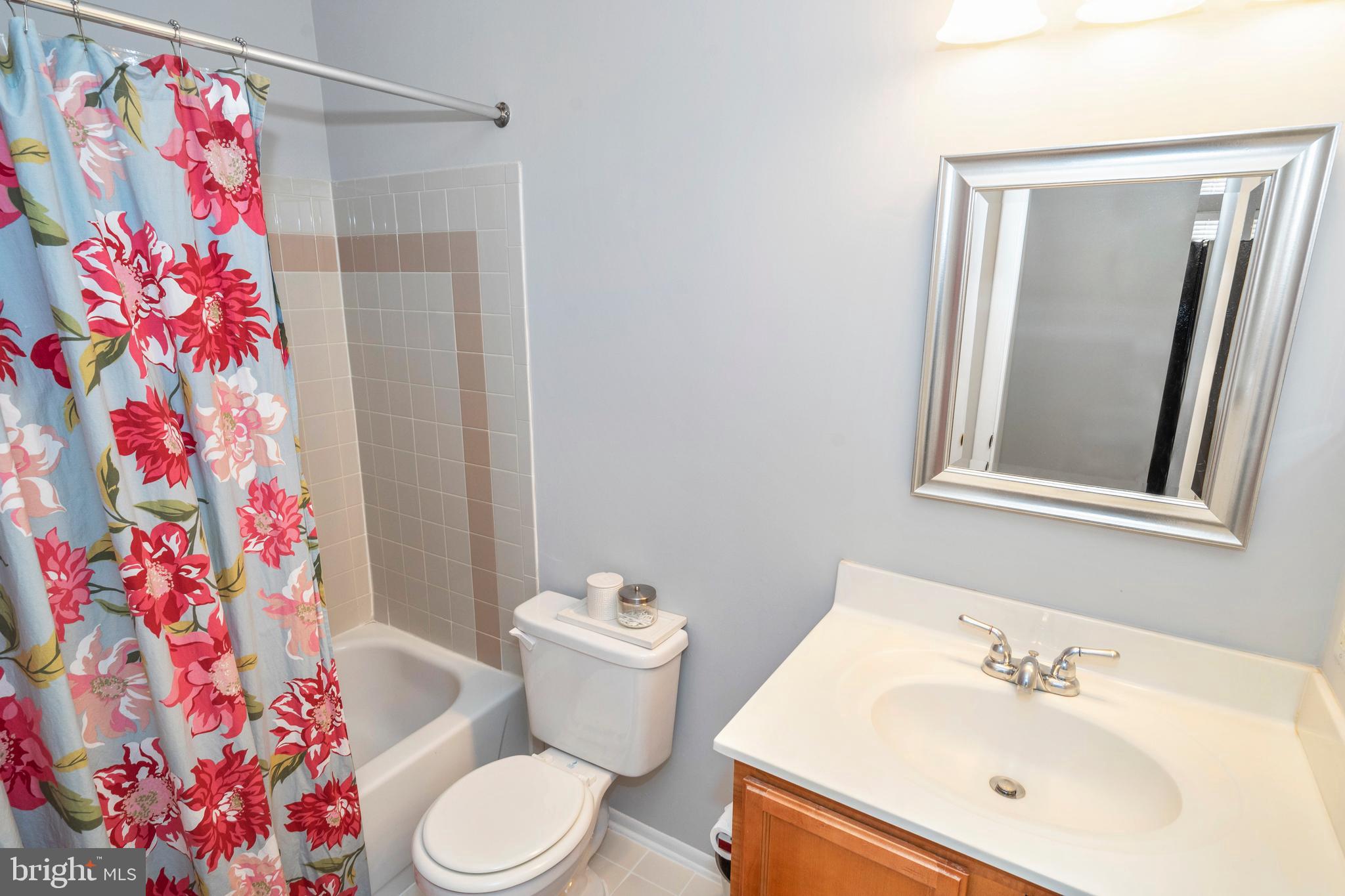 1711 Ascot Way, Unit C Reston, VA 20190 - Photo 14 of 26 Master Bath with Ceramic Tile & Designer Lighting