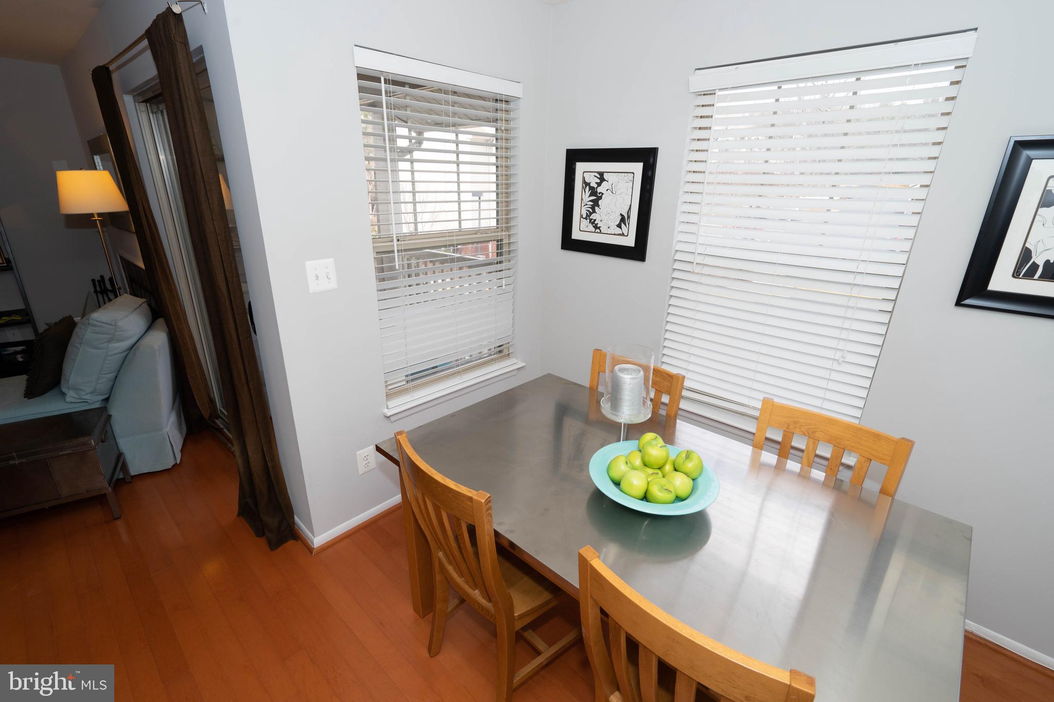 1711 Ascot Way, Unit C Reston, VA 20190 - Photo 5 of 26 Dining Room with Three Large Windows