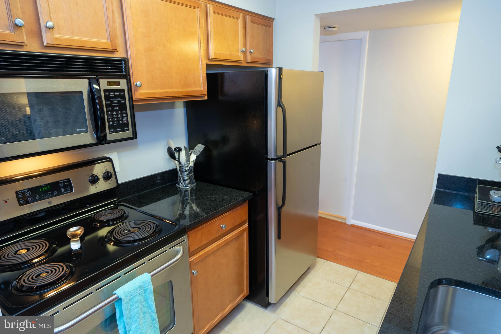 1711 Ascot Way, Unit C Reston, VA 20190 - Photo 8 of 26 Stainless Kitchen with Granite Counters