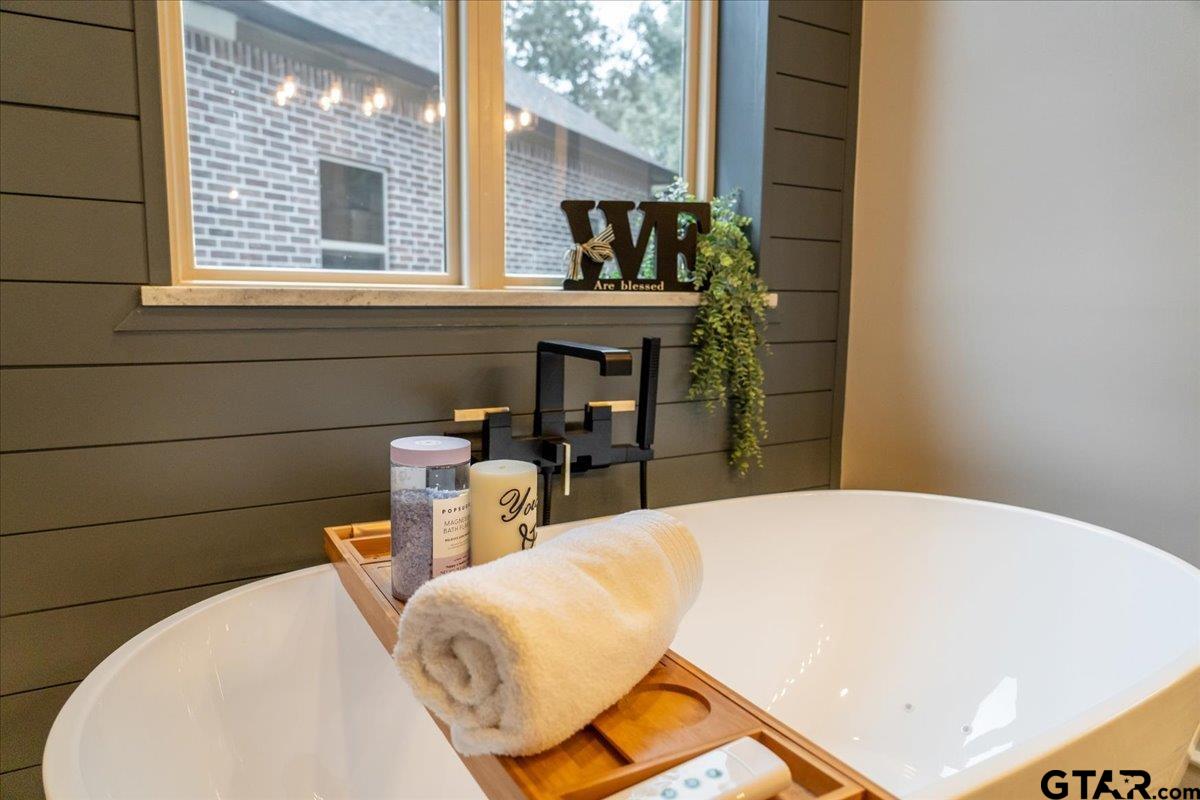 6527 Rochester Way Tyler, TX 75703 - Photo 20 of 48 a bathroom with a sink and a mirror
