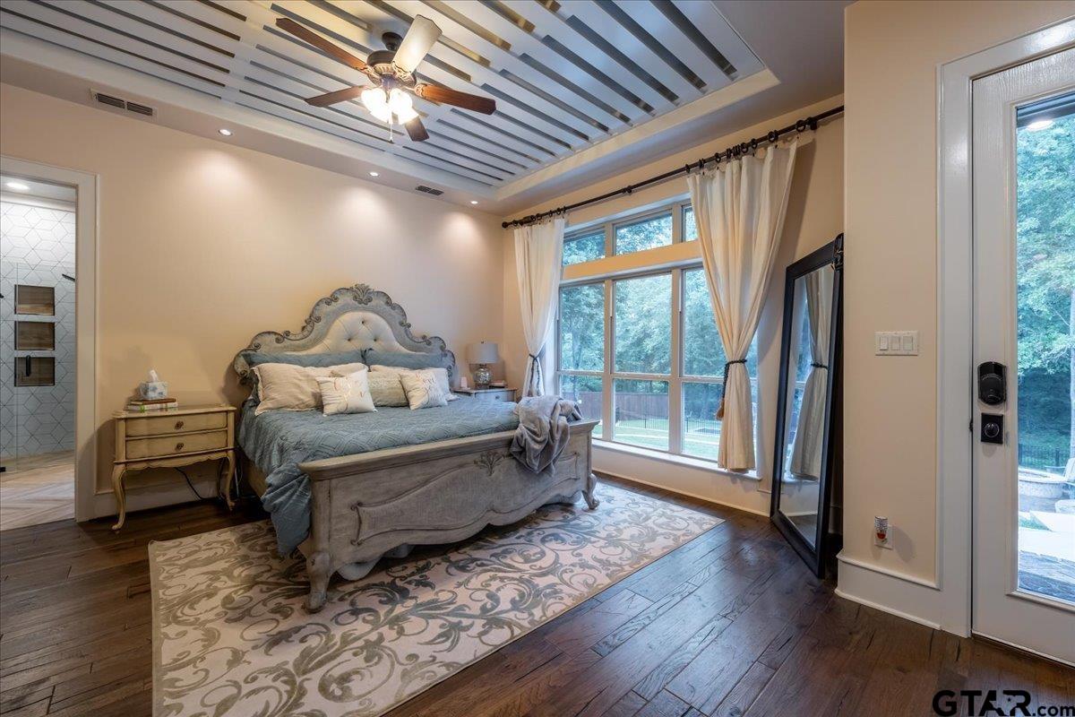 6527 Rochester Way Tyler, TX 75703 - Photo 22 of 48 a living room with furniture window and wooden floor