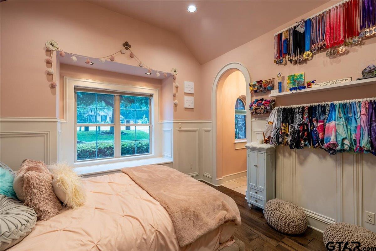 6527 Rochester Way Tyler, TX 75703 - Photo 25 of 48 a bedroom with bed and a window