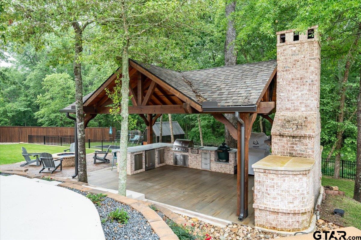 6527 Rochester Way Tyler, TX 75703 - Photo 38 of 48 a view of a patio in backyard