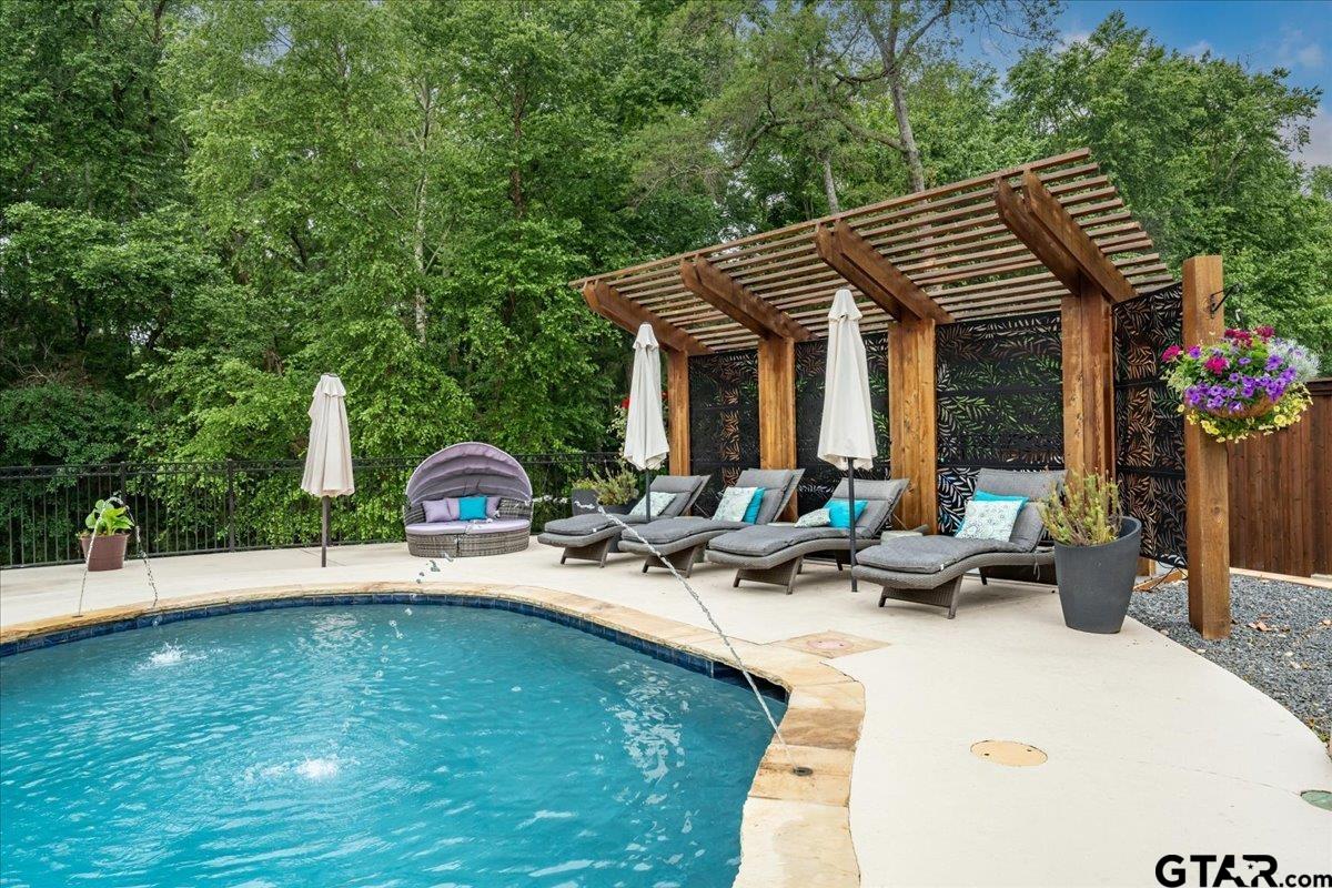 6527 Rochester Way Tyler, TX 75703 - Photo 45 of 48 a backyard of a house with outdoor seating