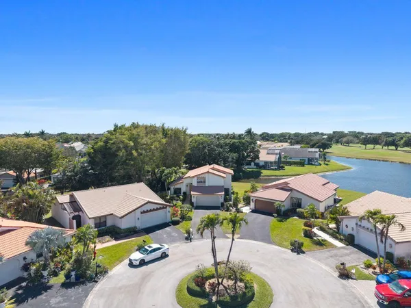 an aerial view of a house with a garden