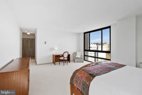 a view of a bedroom and bathroom