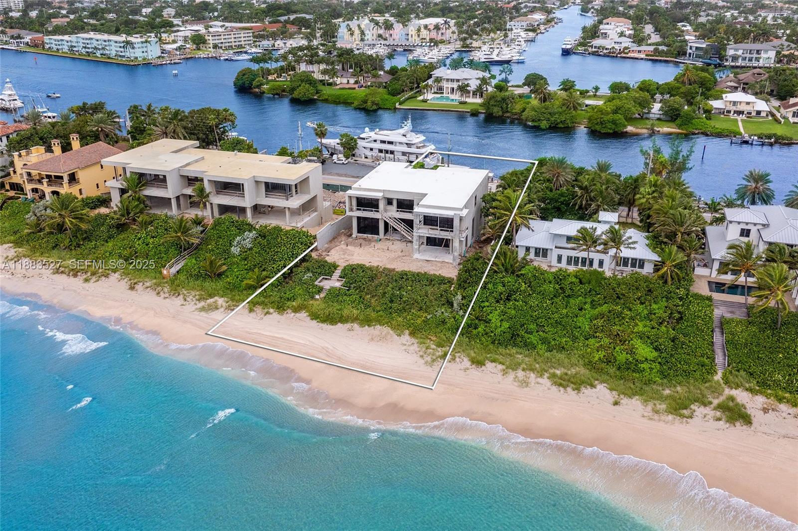 961 Hillsboro Mile Hillsboro Beach, FL 33062 - Photo 15 of 17 an aerial view of a house with outdoor space and lake view in back