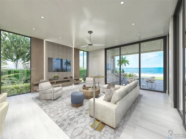 a living room with patio furniture and a flat screen tv