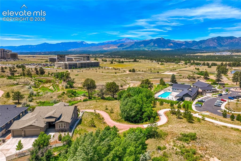 1011 Charismatic Way Colorado Springs, CO 80921 - Photo 3 of 50 Sweeping views of Pikes Peak, the Front Range, Air Force Academy, and protected open spacecreate an extraordinary setting.