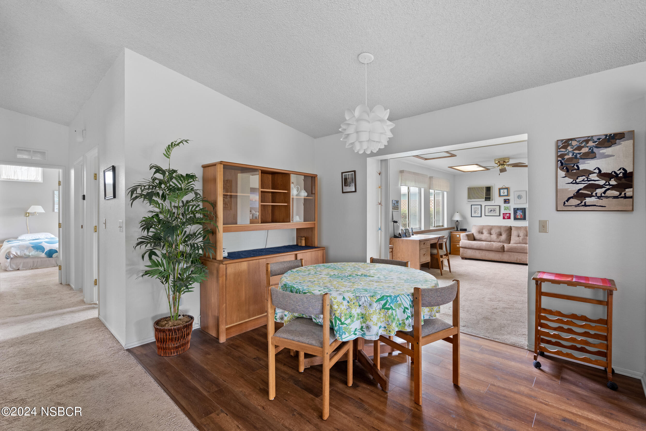 961 North Ridge View Drive Santa Maria, CA 93455 - Photo 16 of 37 a view of a dining room with furniture and wooden floor