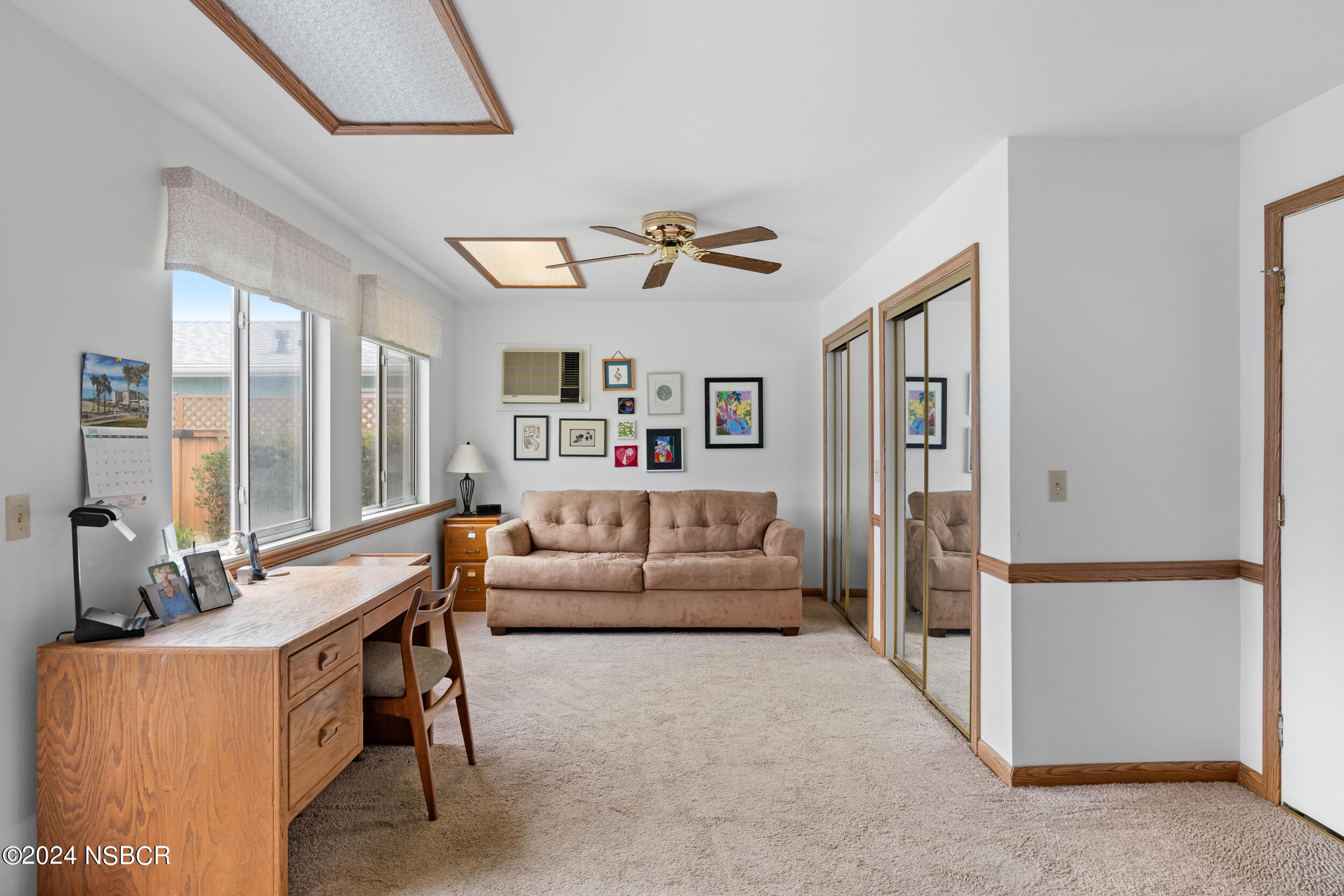 961 North Ridge View Drive Santa Maria, CA 93455 - Photo 17 of 37 a living room with furniture and a table
