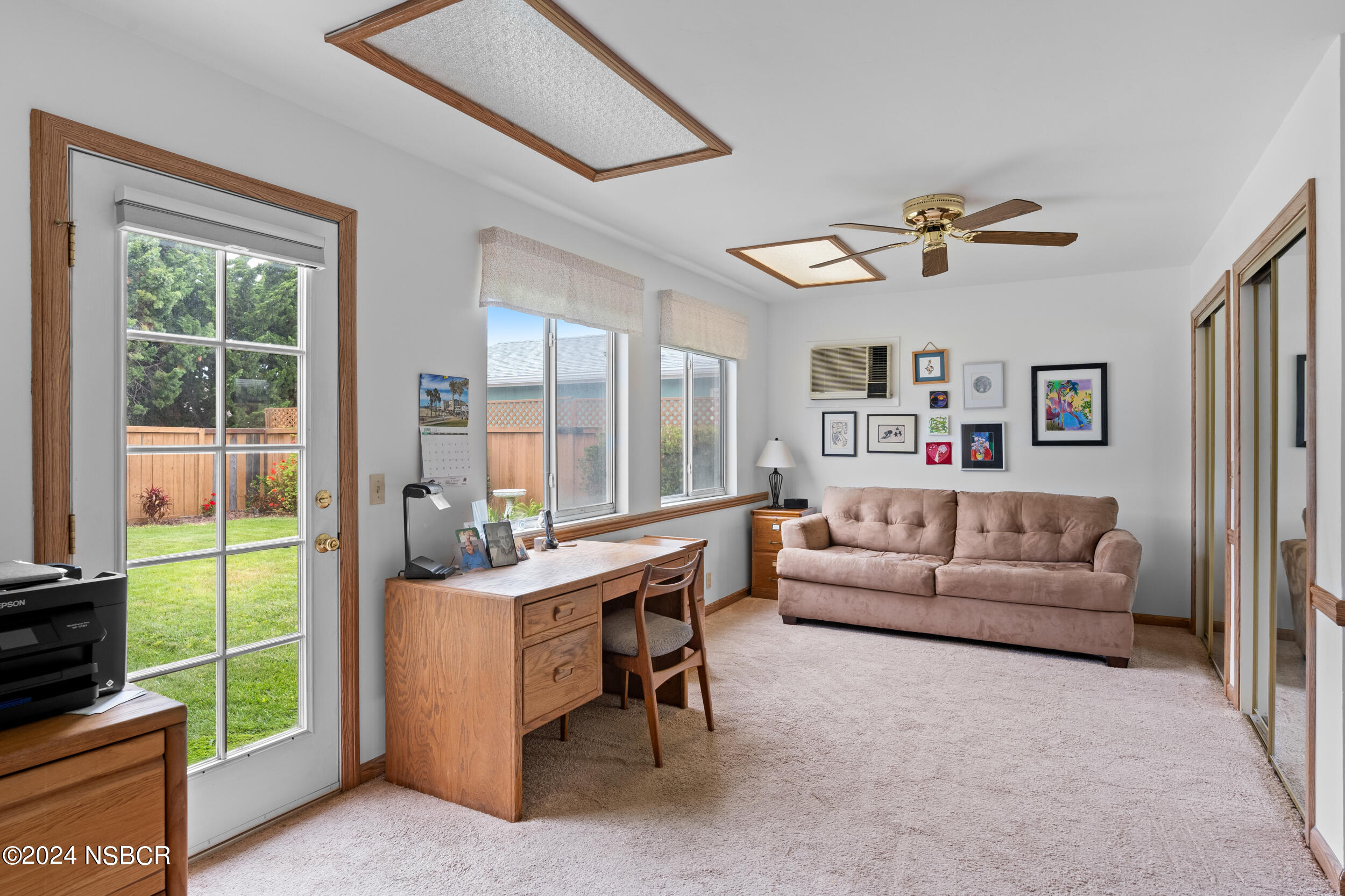 961 North Ridge View Drive Santa Maria, CA 93455 - Photo 18 of 37 a living room with furniture and a flat screen tv