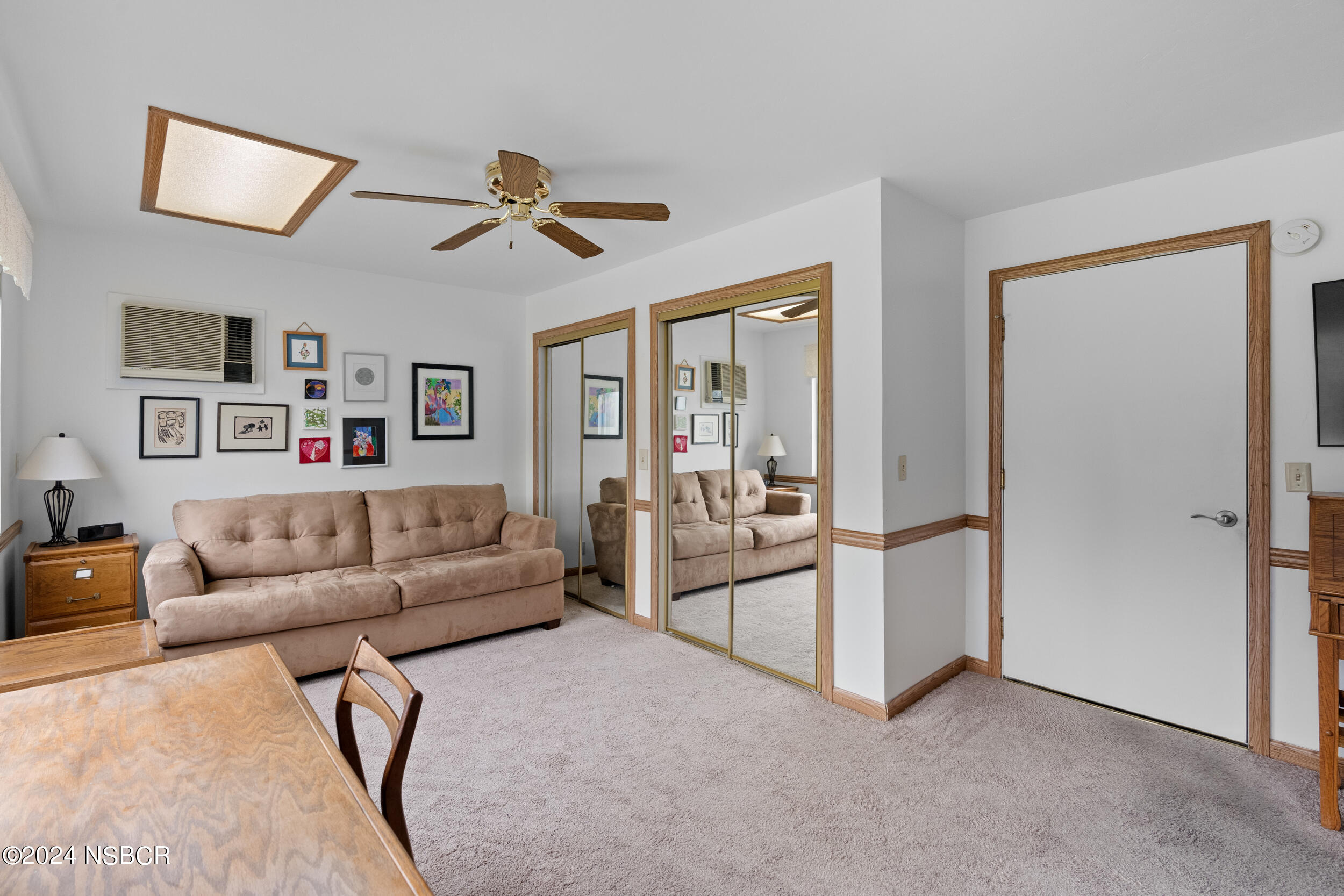 961 North Ridge View Drive Santa Maria, CA 93455 - Photo 19 of 37 a living room with furniture and a flat screen tv