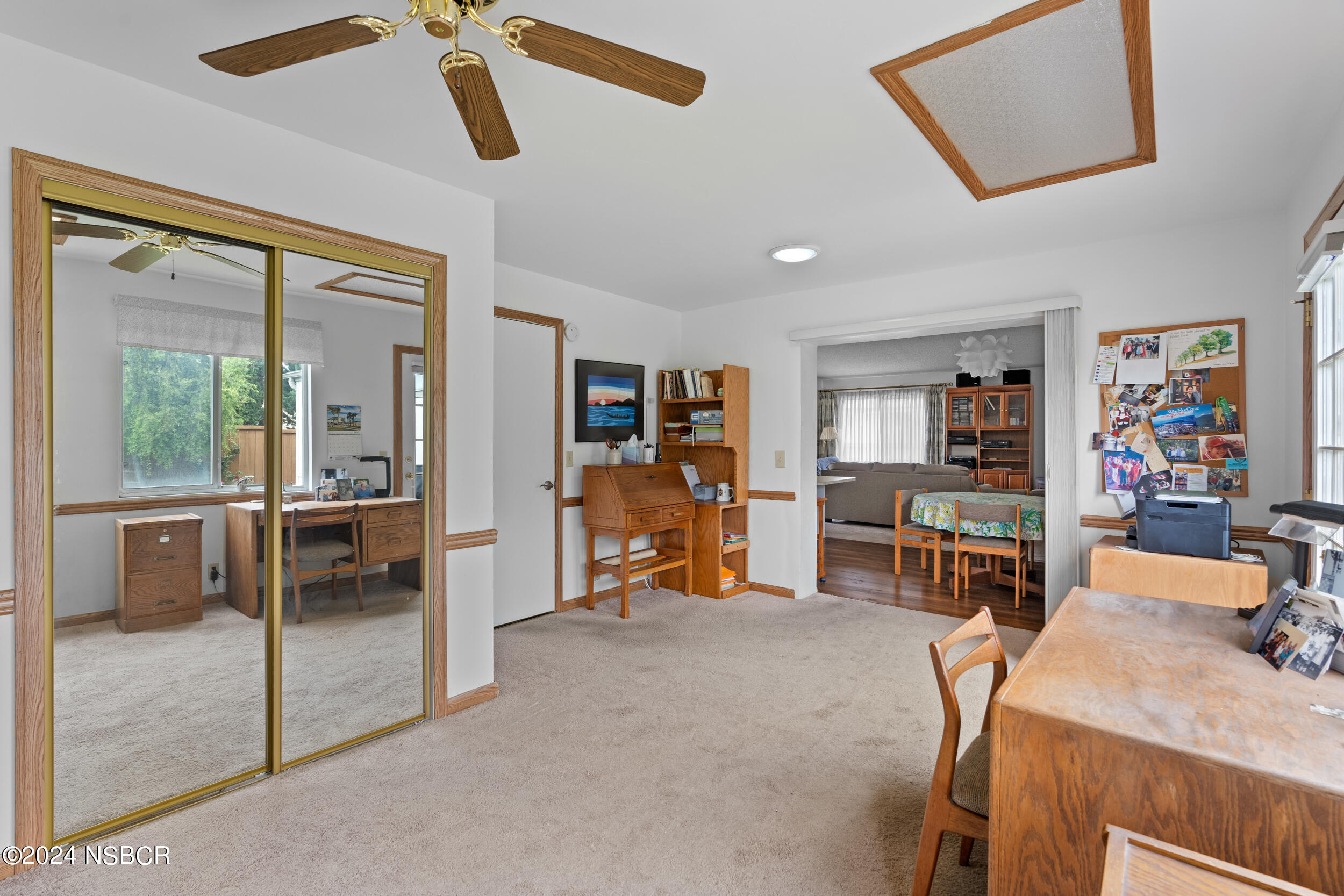 961 North Ridge View Drive Santa Maria, CA 93455 - Photo 20 of 37 a view of a livingroom with workspace and furniture