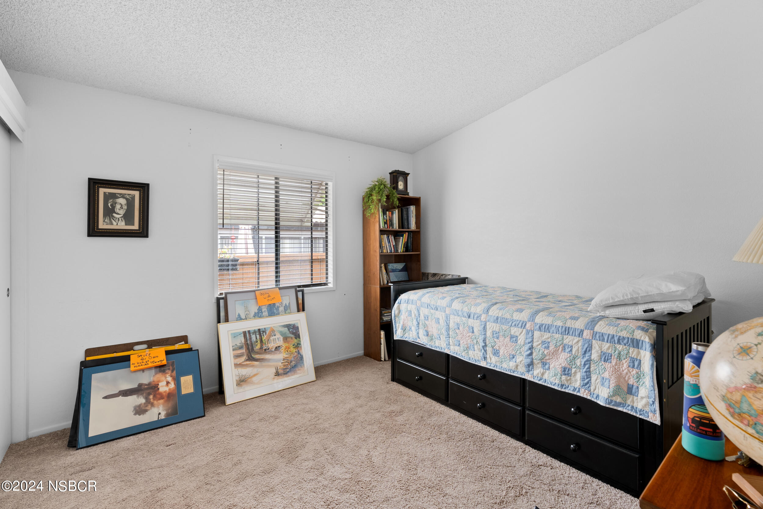 961 North Ridge View Drive Santa Maria, CA 93455 - Photo 21 of 37 a bed room with a bed and a window