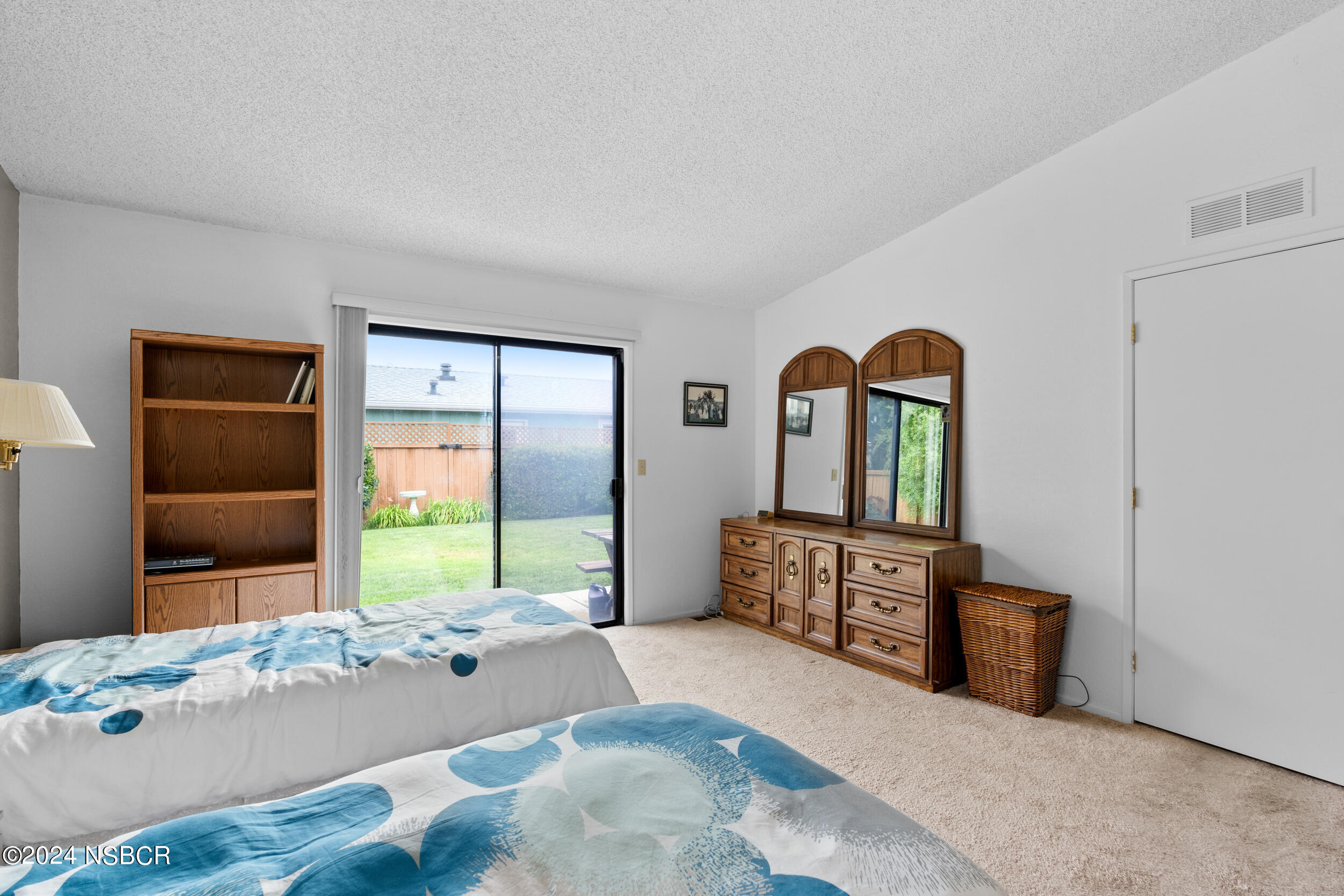 961 North Ridge View Drive Santa Maria, CA 93455 - Photo 24 of 37 a bedroom with a bed and a dresser
