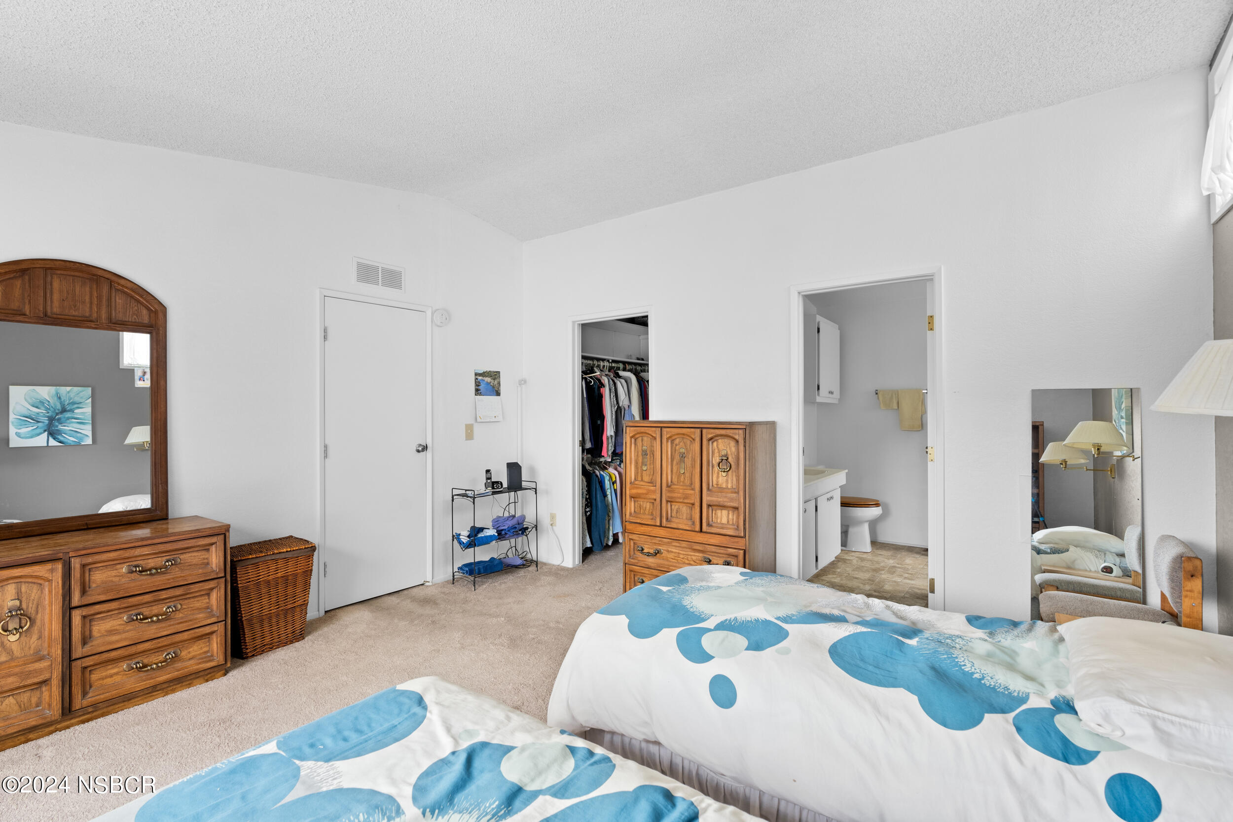 961 North Ridge View Drive Santa Maria, CA 93455 - Photo 25 of 37 a bedroom with a bed and furniture