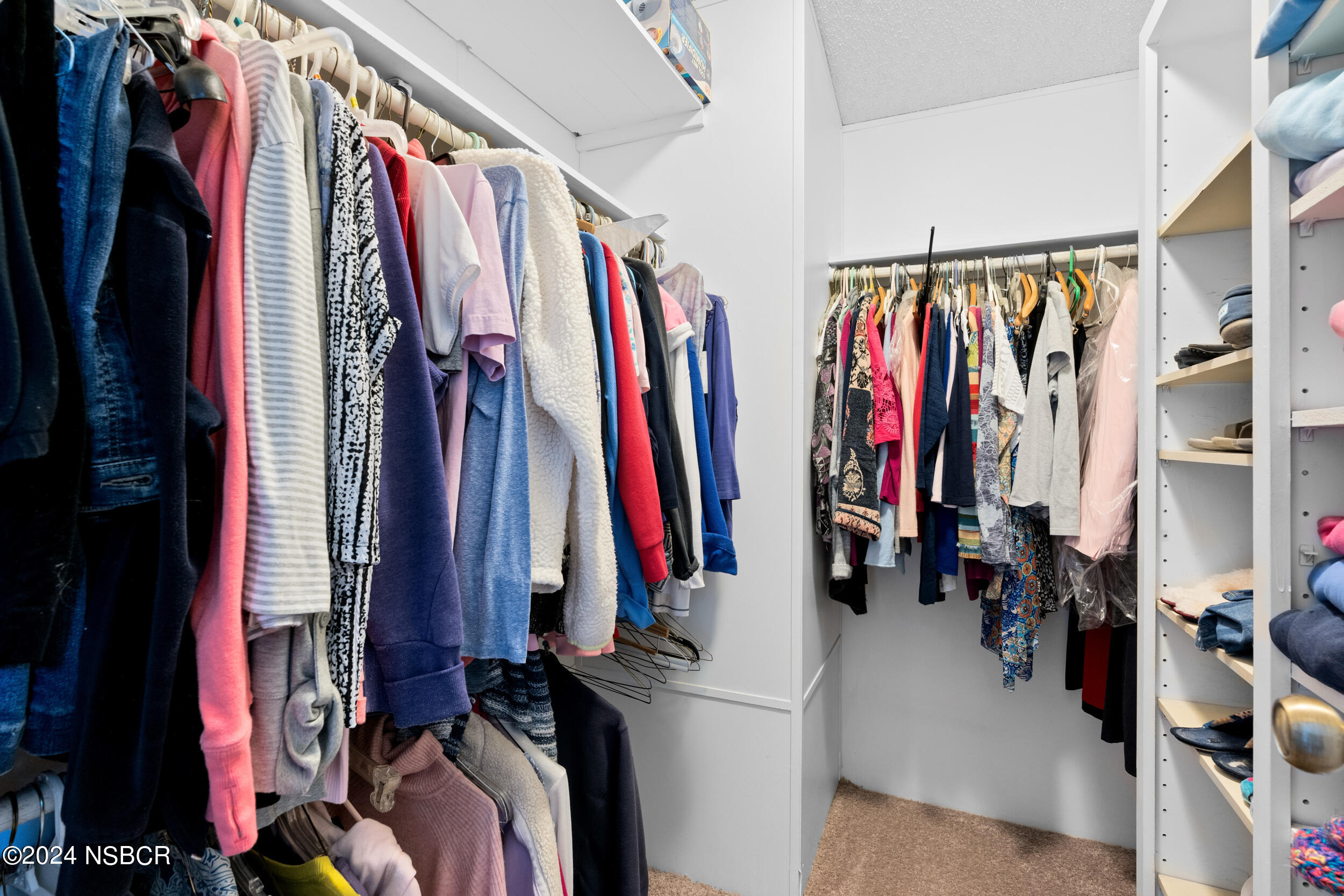 961 North Ridge View Drive Santa Maria, CA 93455 - Photo 28 of 37 a view of walk in closet with clothes