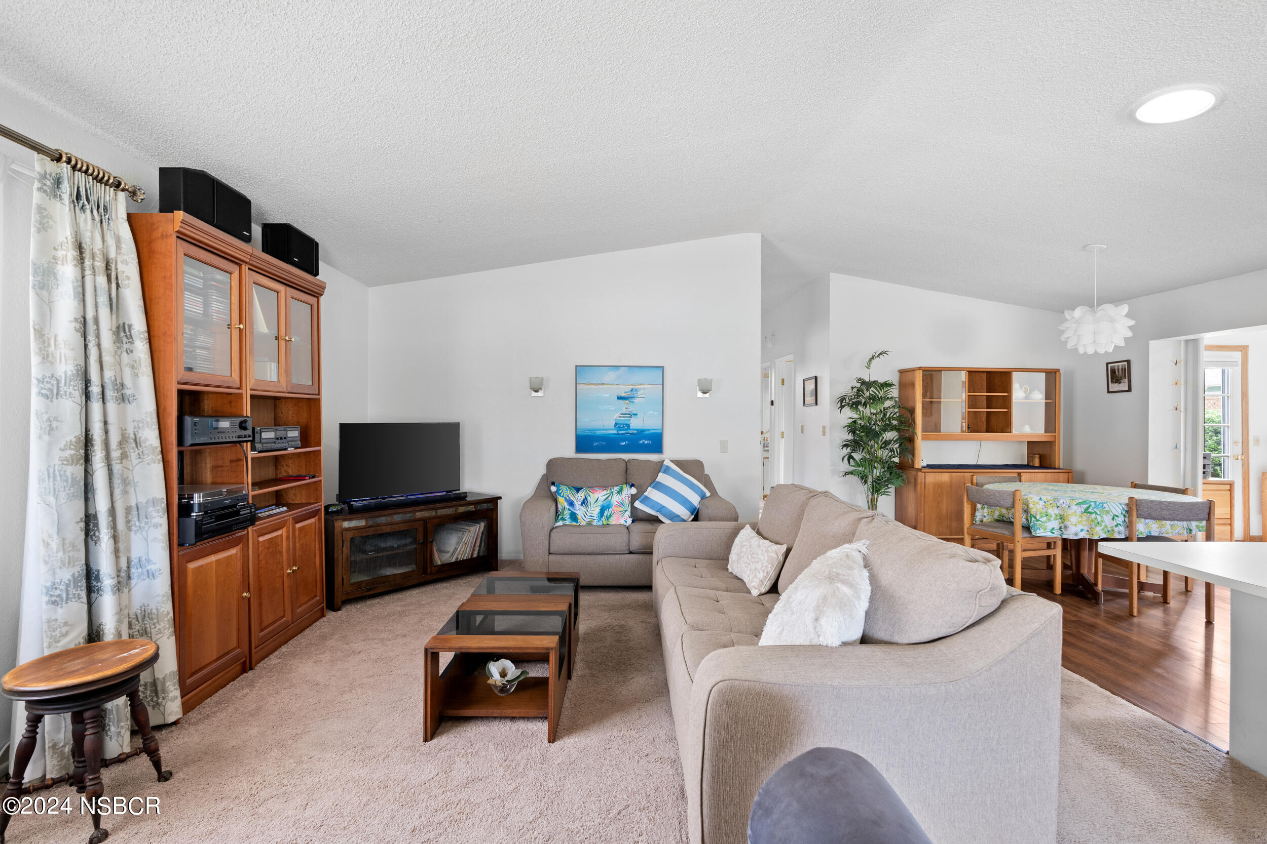 961 North Ridge View Drive Santa Maria, CA 93455 - Photo 8 of 37 a living room with furniture and a flat screen tv