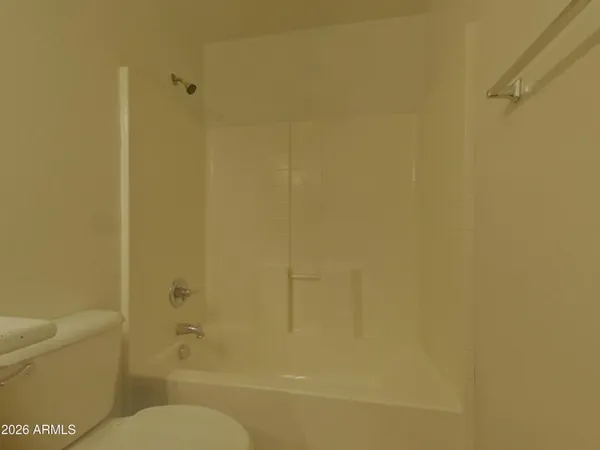 a bathroom with a bathtub and a sink