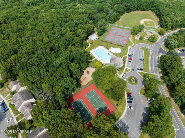 a sign that is in front of flowers