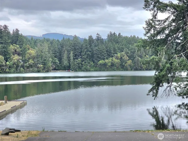 a view of a lake from a balcony