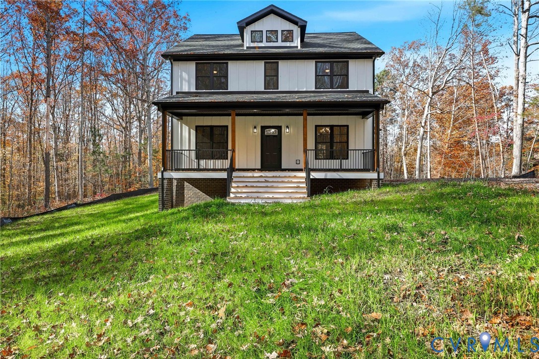 front view of a house with a yard
