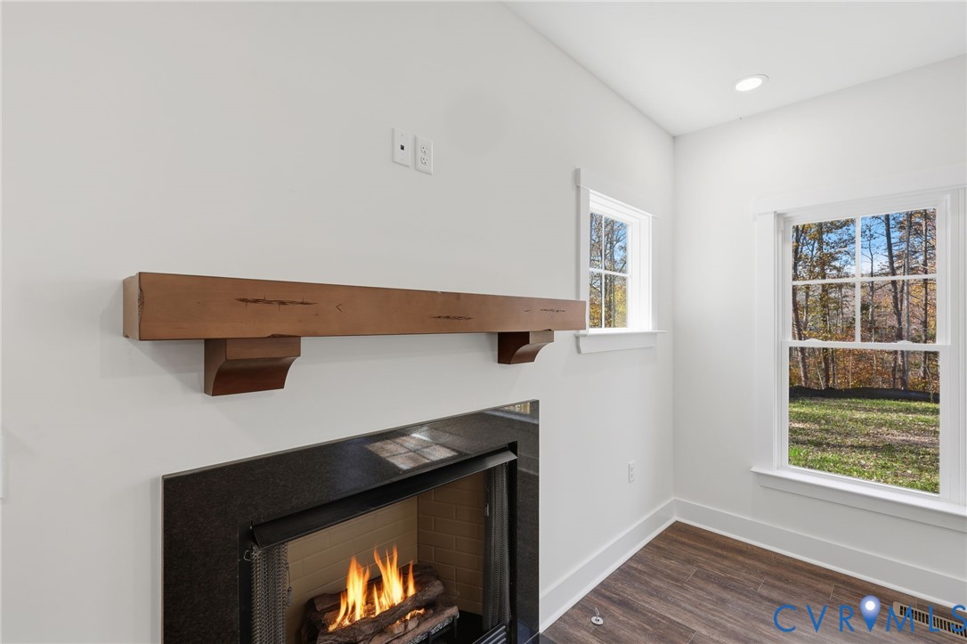 4062 Lake Killarney Road Gum Spring, VA 23065 - Photo 13 of 37 a view of room with window and wooden floor