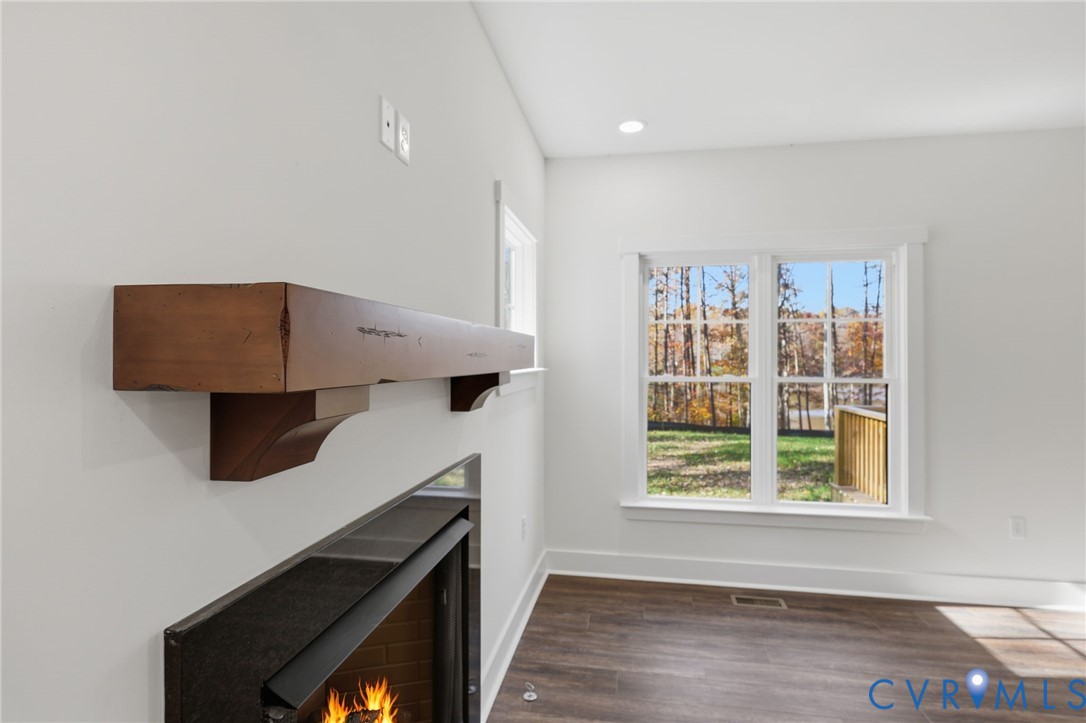 4062 Lake Killarney Road Gum Spring, VA 23065 - Photo 10 of 37 a kitchen with a stove and a microwave