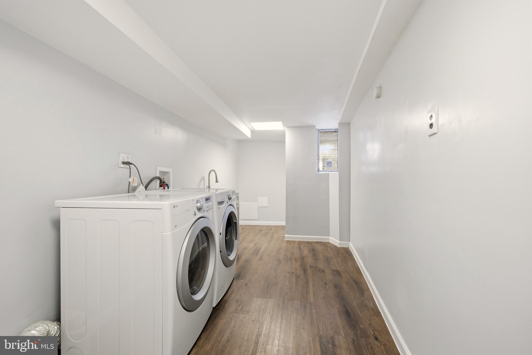 171 Juniper Road Havertown, PA 19083 - Photo 21 of 31 a view of storage and utility room with washer and dryer