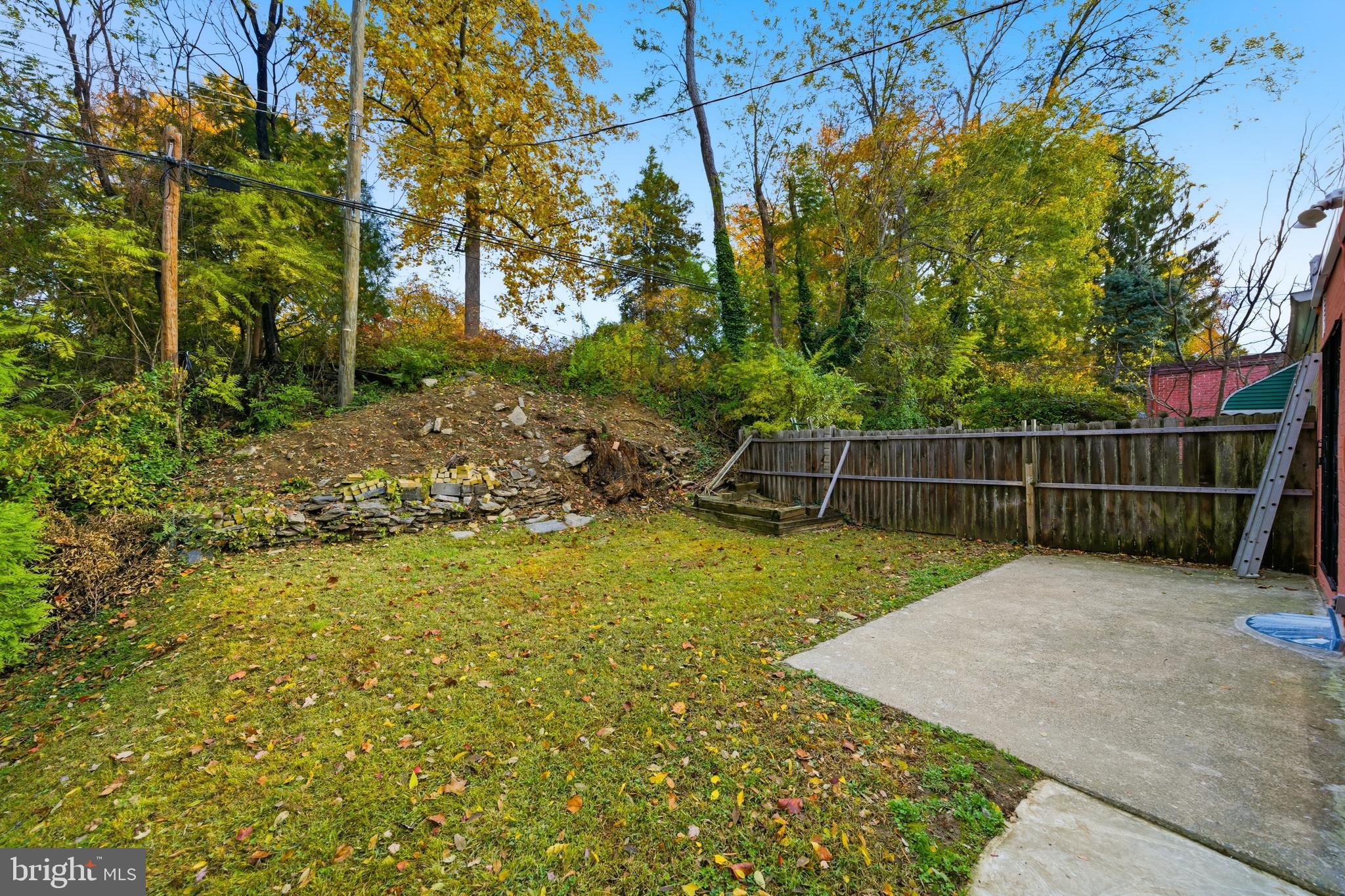 171 Juniper Road Havertown, PA 19083 - Photo 25 of 31 a view of a backyard with wooden fence