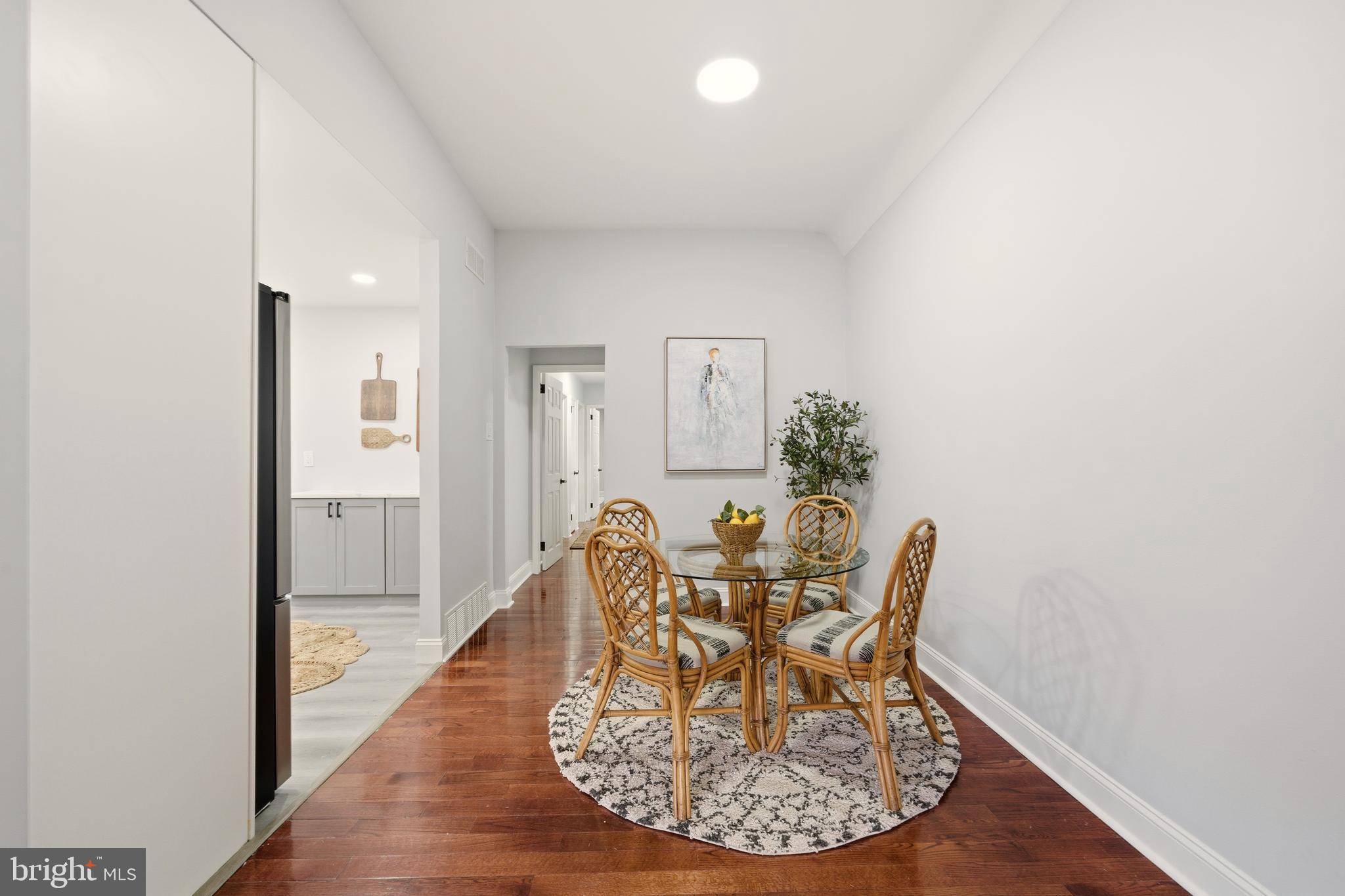 171 Juniper Road Havertown, PA 19083 - Photo 6 of 31 a view of a dining room with furniture and wooden floor