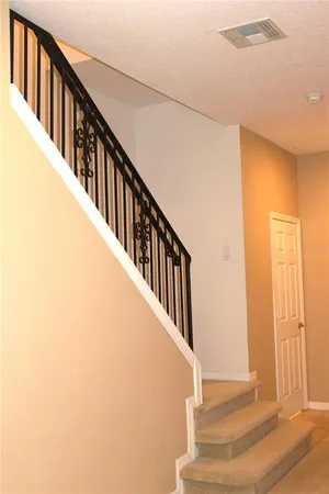 a view of livingroom and has a window