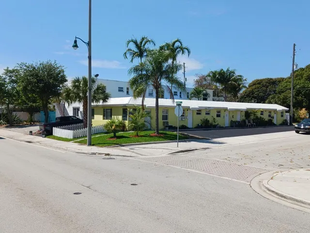 a view of a street with a building