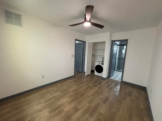 a view of an empty room and window