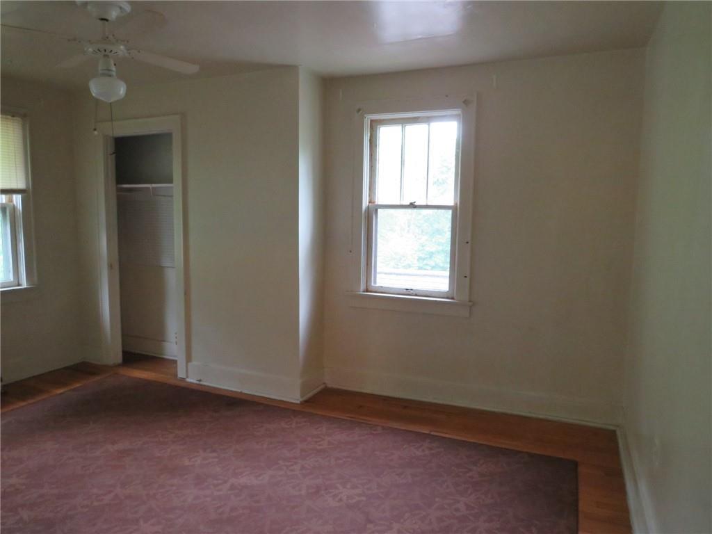 423 Braddock Road Pittsburgh, PA 15221 - Photo 22 of 36 an empty room with windows