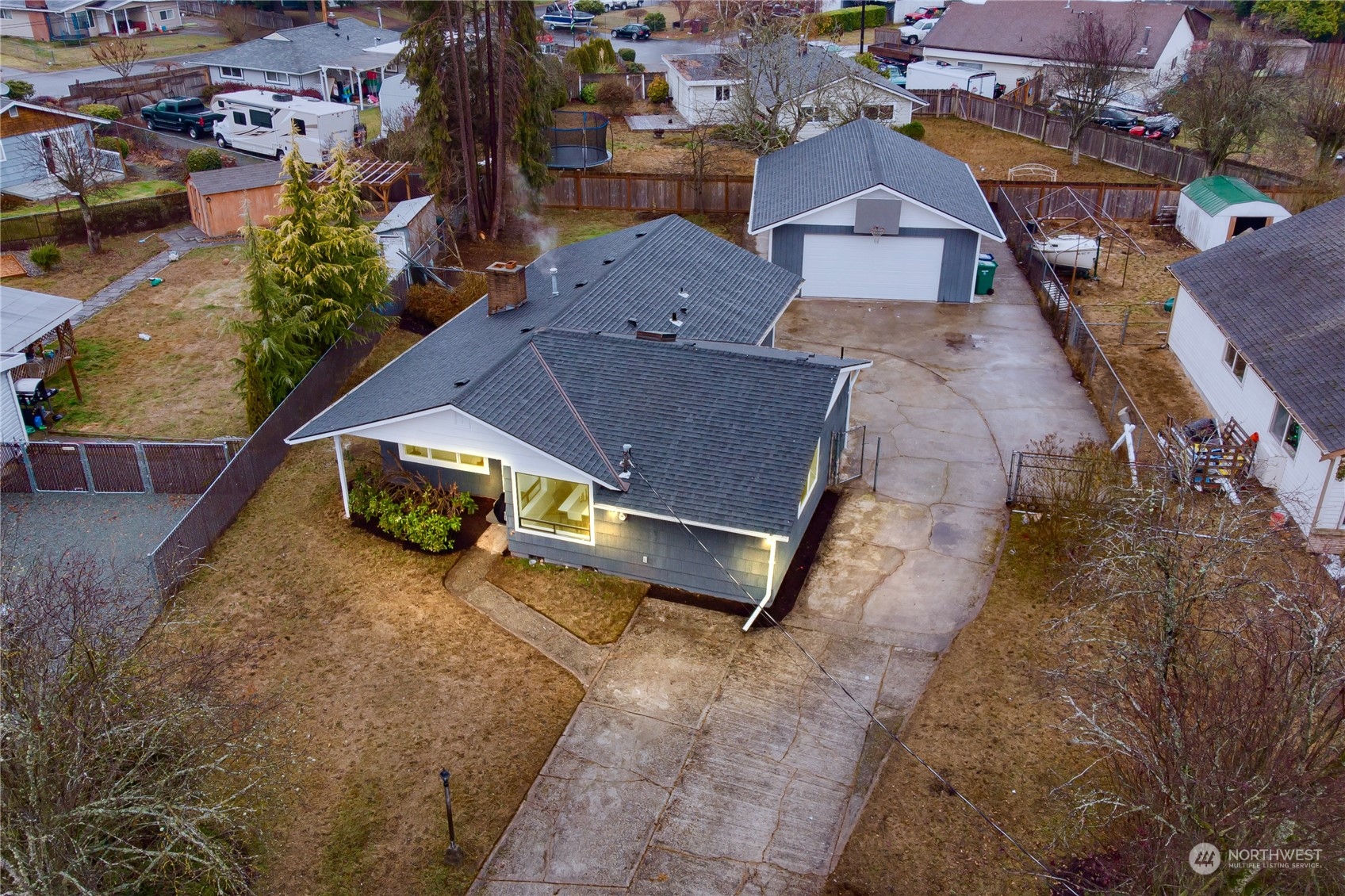 1272 South 315th Street Federal Way, WA 98003 - Photo 1 of 29 an aerial view of a house with a yard