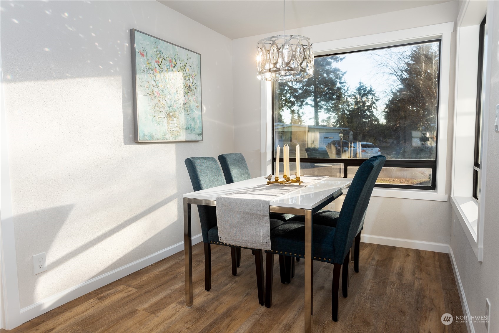 1272 South 315th Street Federal Way, WA 98003 - Photo 15 of 29 a view of a dining room with furniture window and wooden floor