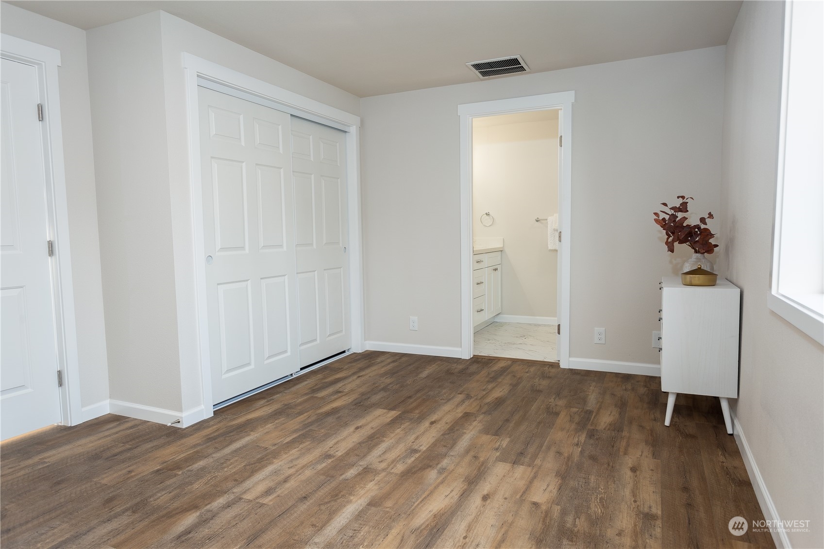 1272 South 315th Street Federal Way, WA 98003 - Photo 19 of 29 an empty room with wooden floor and closet