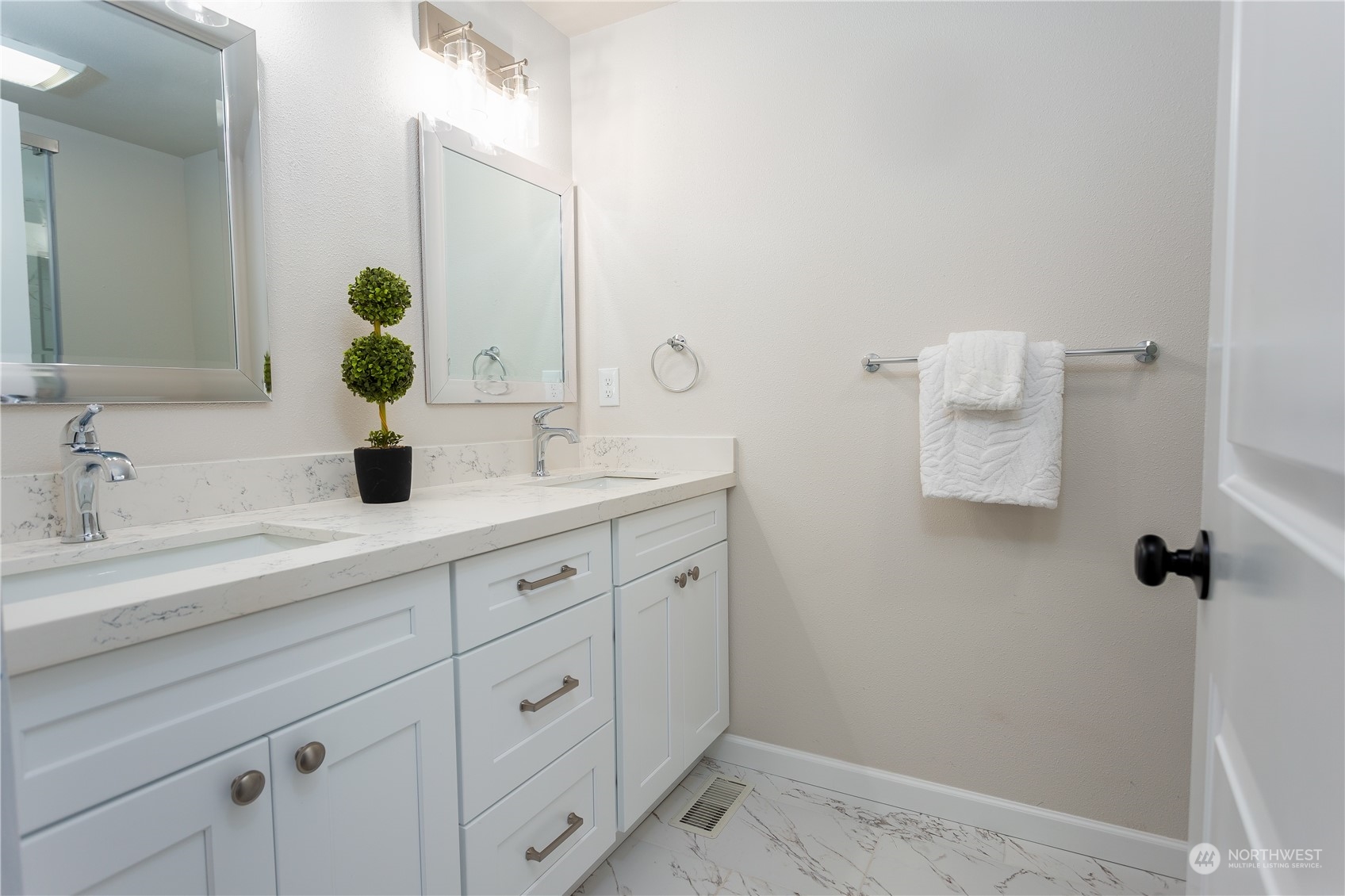 1272 South 315th Street Federal Way, WA 98003 - Photo 21 of 29 a bathroom with a double vanity sink and mirror