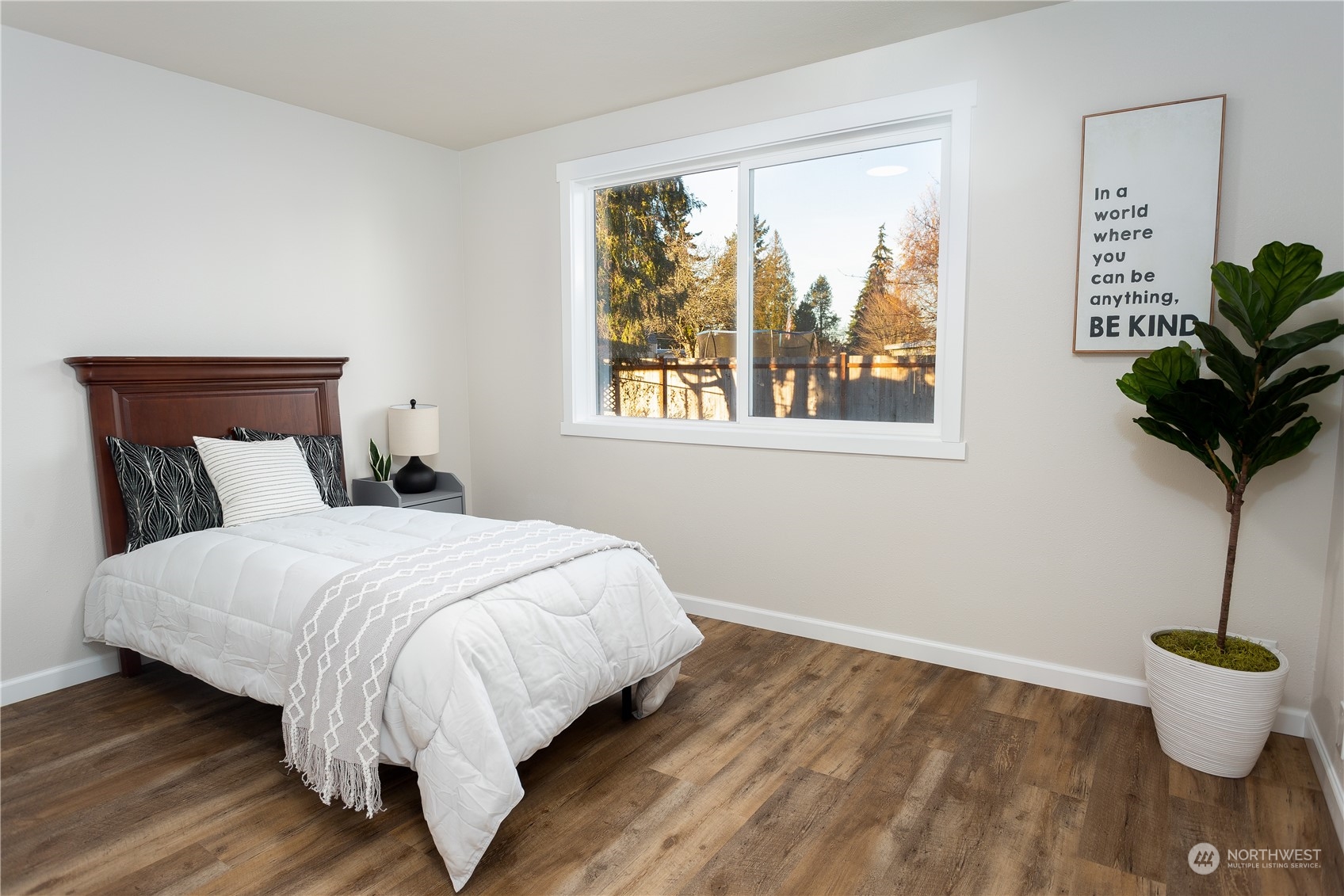 1272 South 315th Street Federal Way, WA 98003 - Photo 26 of 29 a bedroom with a bed and a potted plant