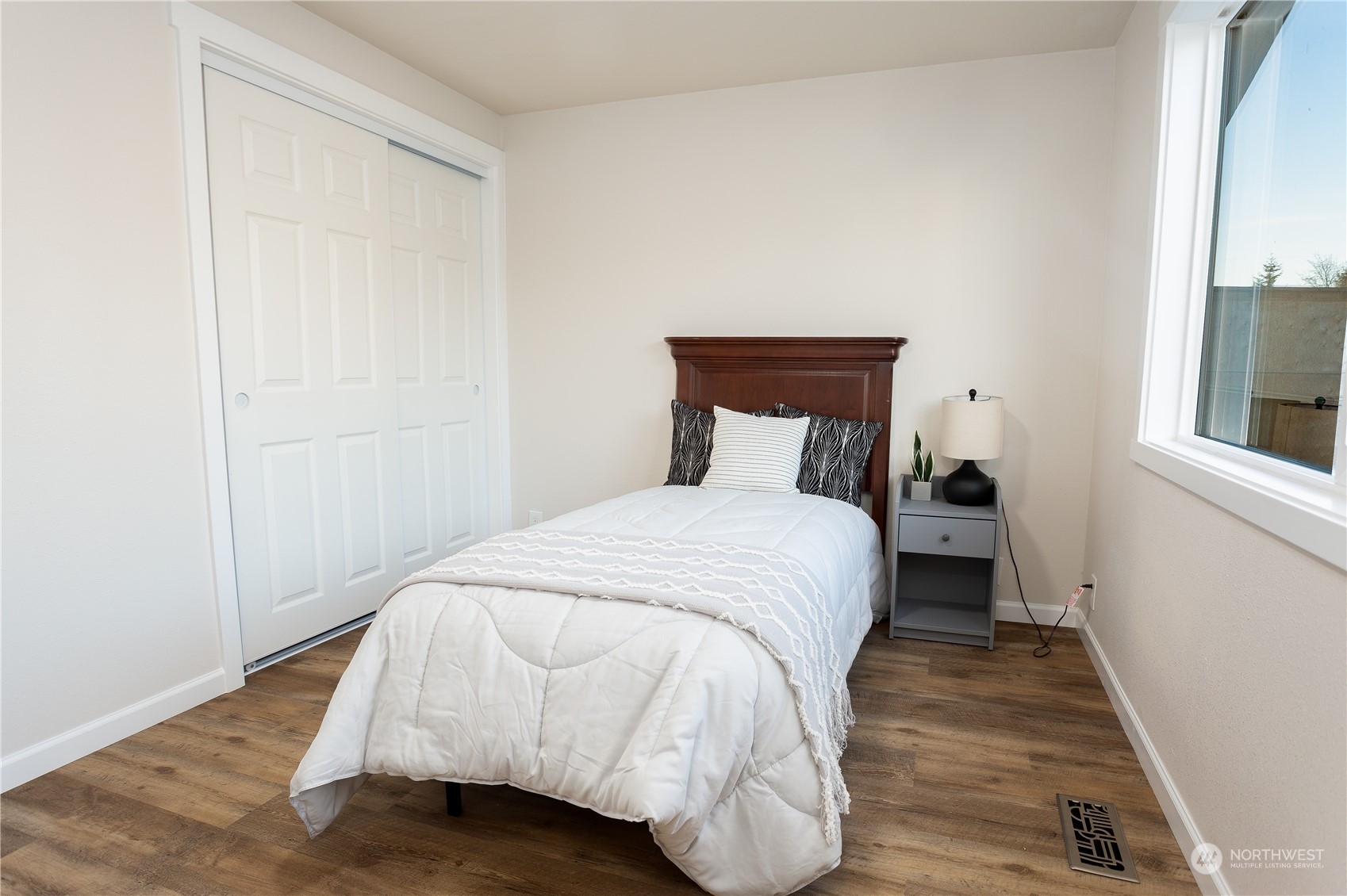 1272 South 315th Street Federal Way, WA 98003 - Photo 27 of 29 a bedroom with a bed and a window