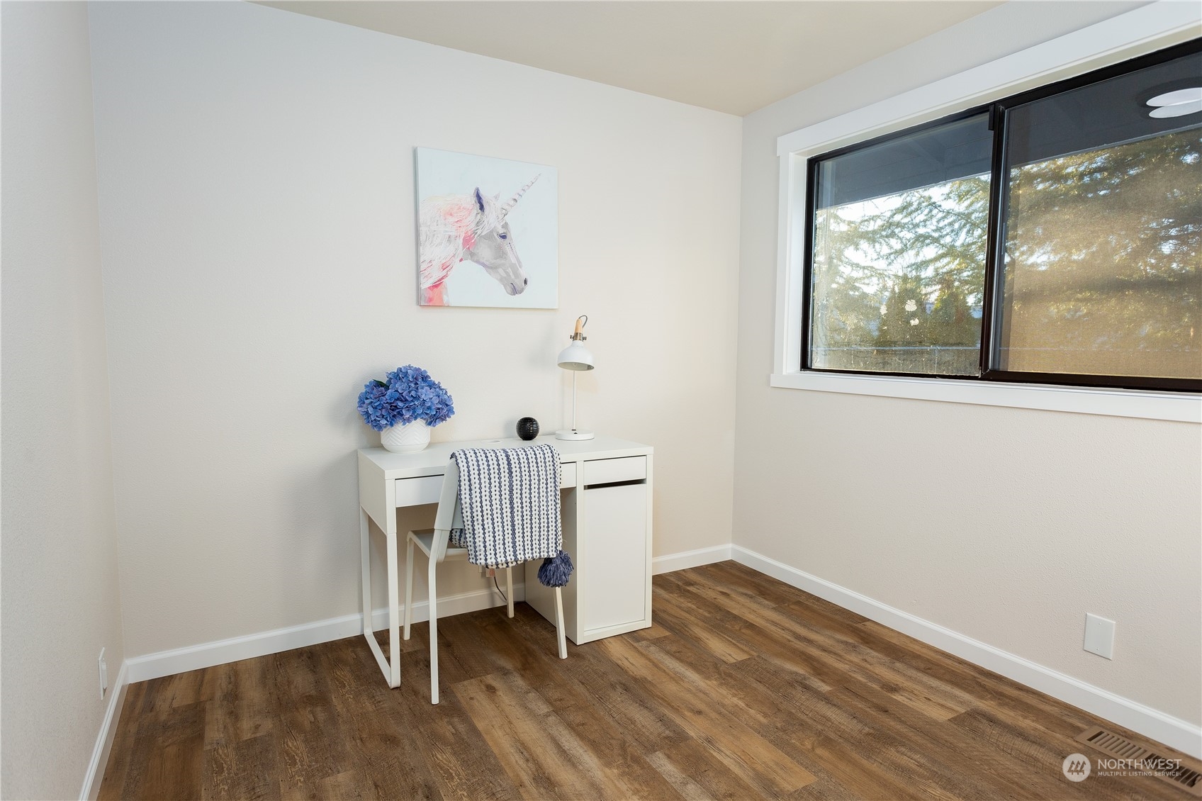 1272 South 315th Street Federal Way, WA 98003 - Photo 28 of 29 a view of empty room with wooden floor and fan