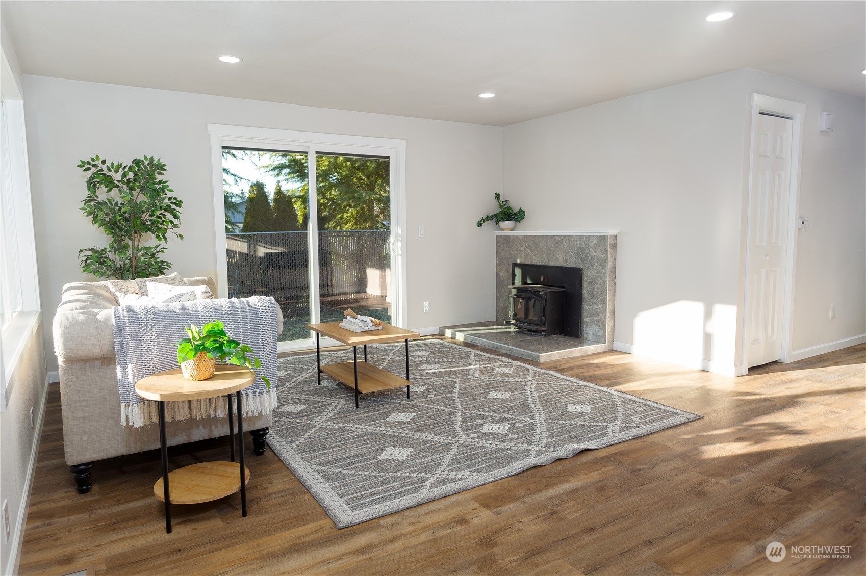 1272 South 315th Street Federal Way, WA 98003 - Photo 9 of 29 a living room with furniture and a fireplace