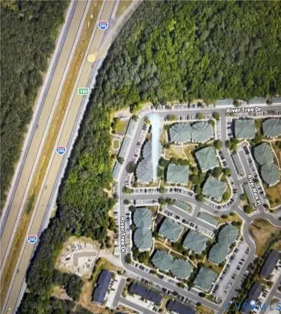 an aerial view of residential house with outdoor space