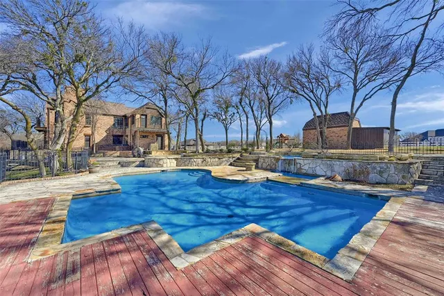 a view of a house with swimming pool